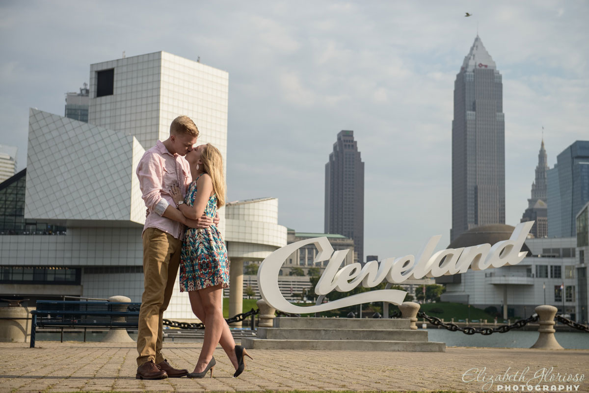 Engagement session on East 9th Street pier with Cleveland skyline in Cleveland, Ohio